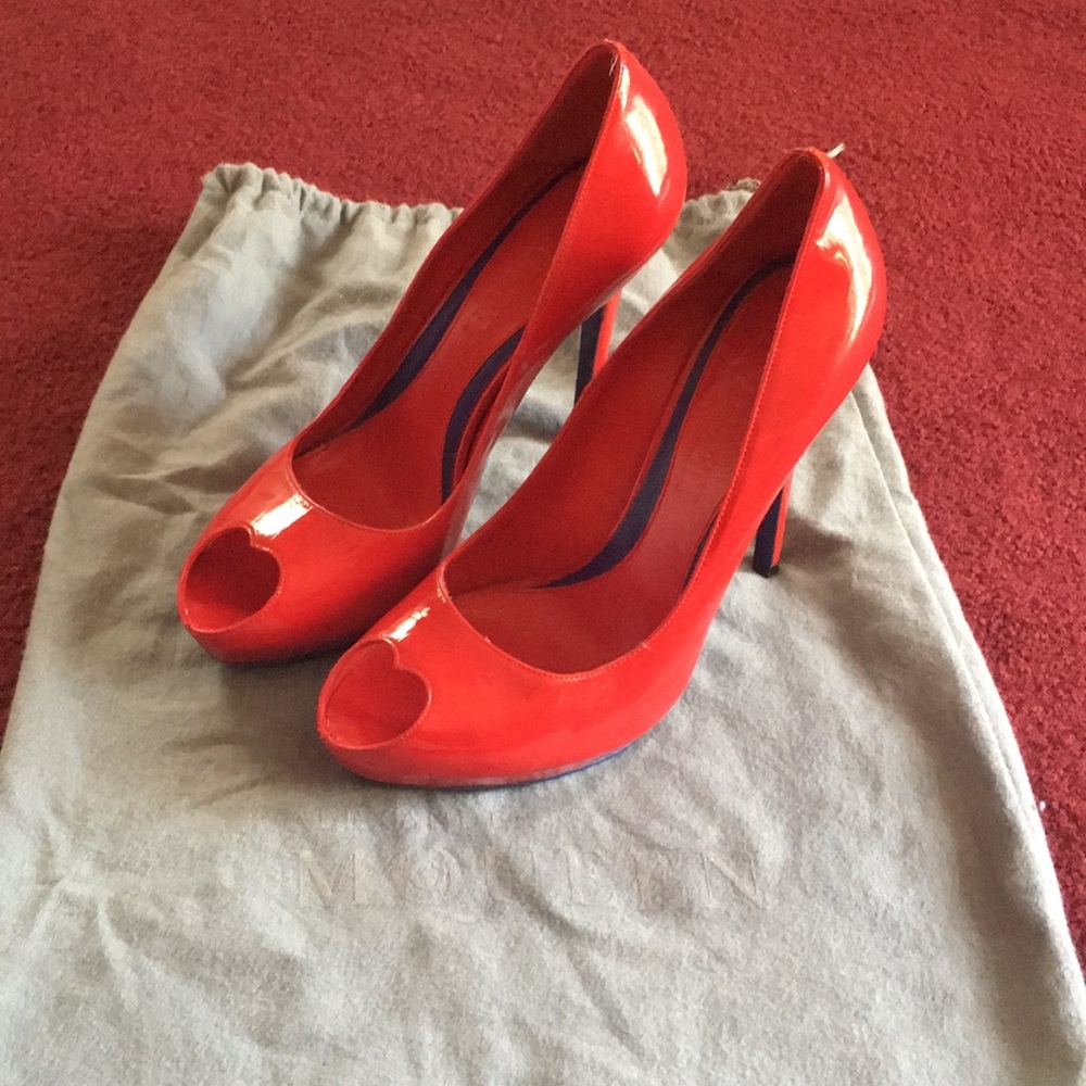 Alexander McQueen red patent leather heel.